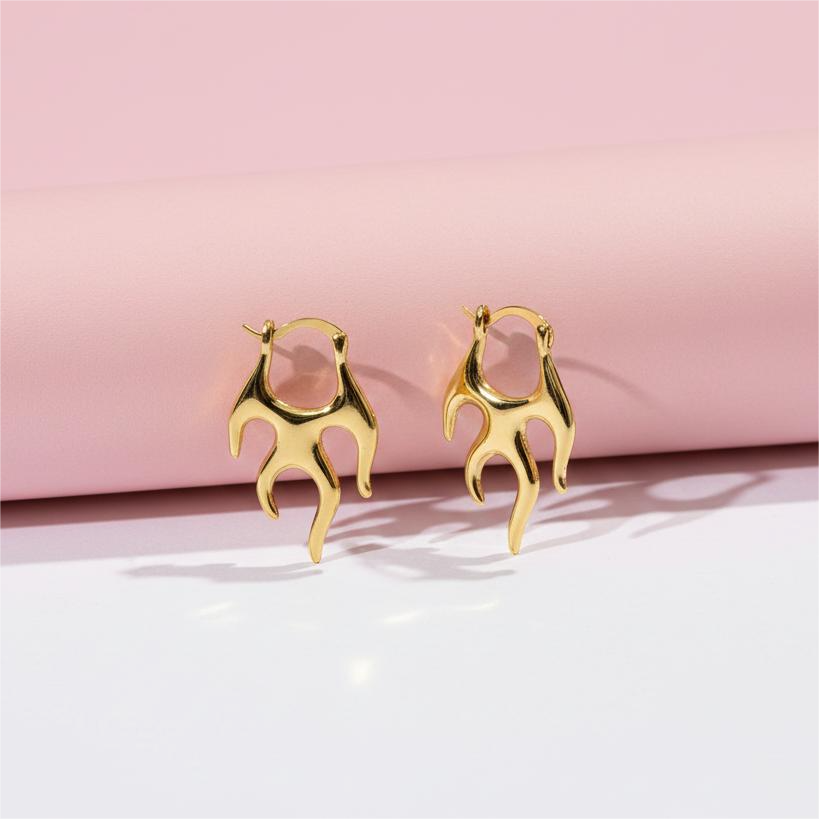 Designer gold tone flame earrings Shadowborne